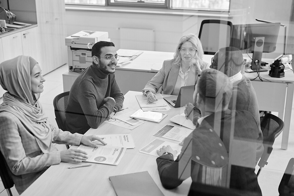 Group discussion in an office with internal team